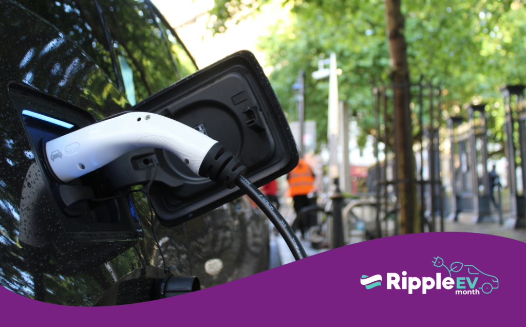 Ripple EV month has started. Image of electric vehicle plugged in to charge with Ripple logo and purple wave at the bottom.